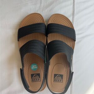 Reef Water Black and Tan Slides. Brand new never been worn/waterproof. size 8
